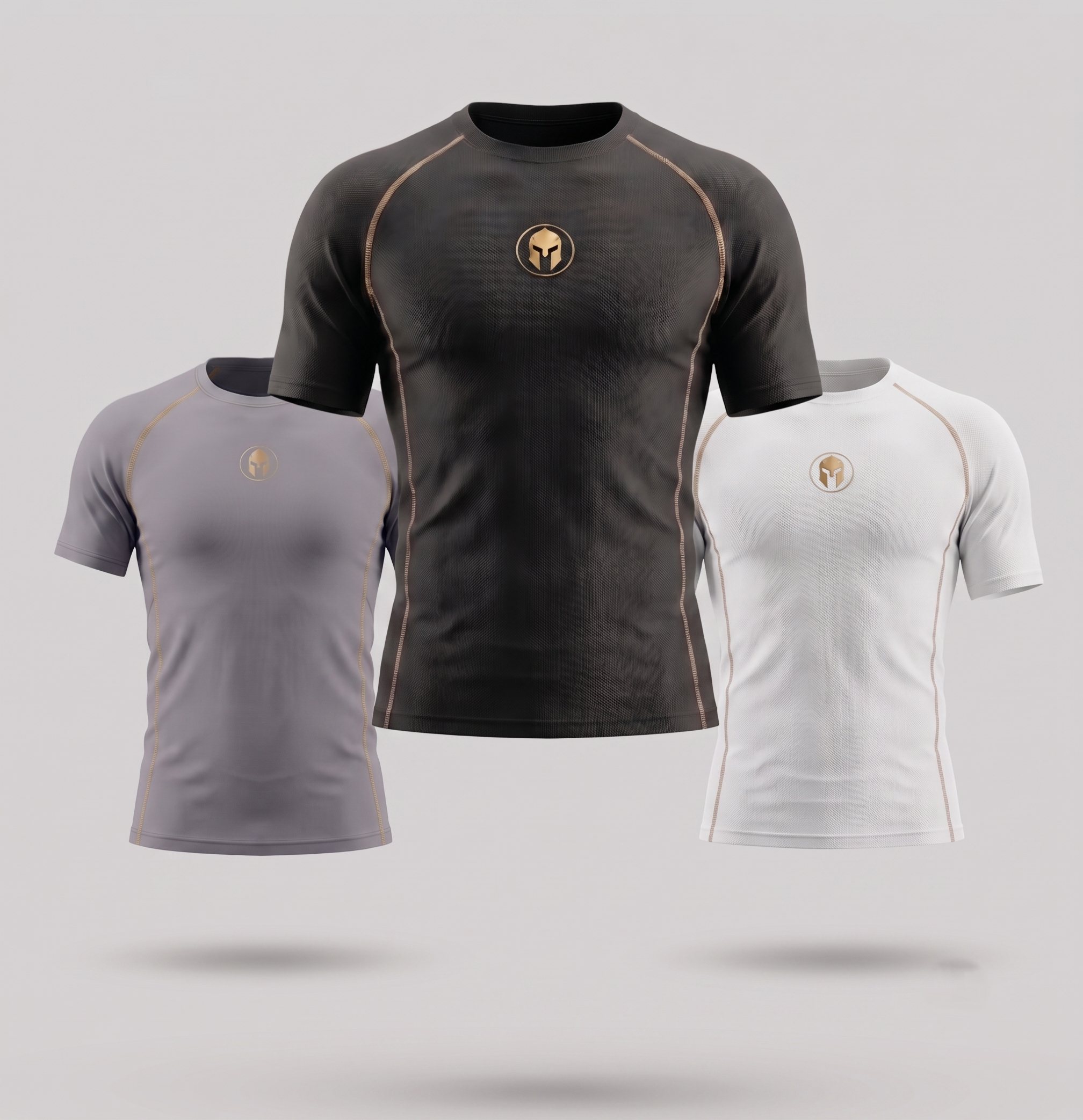 Kit AURUM No-Gi — três rashguards AURUM, preta, cinza e branca, com a marca dourada